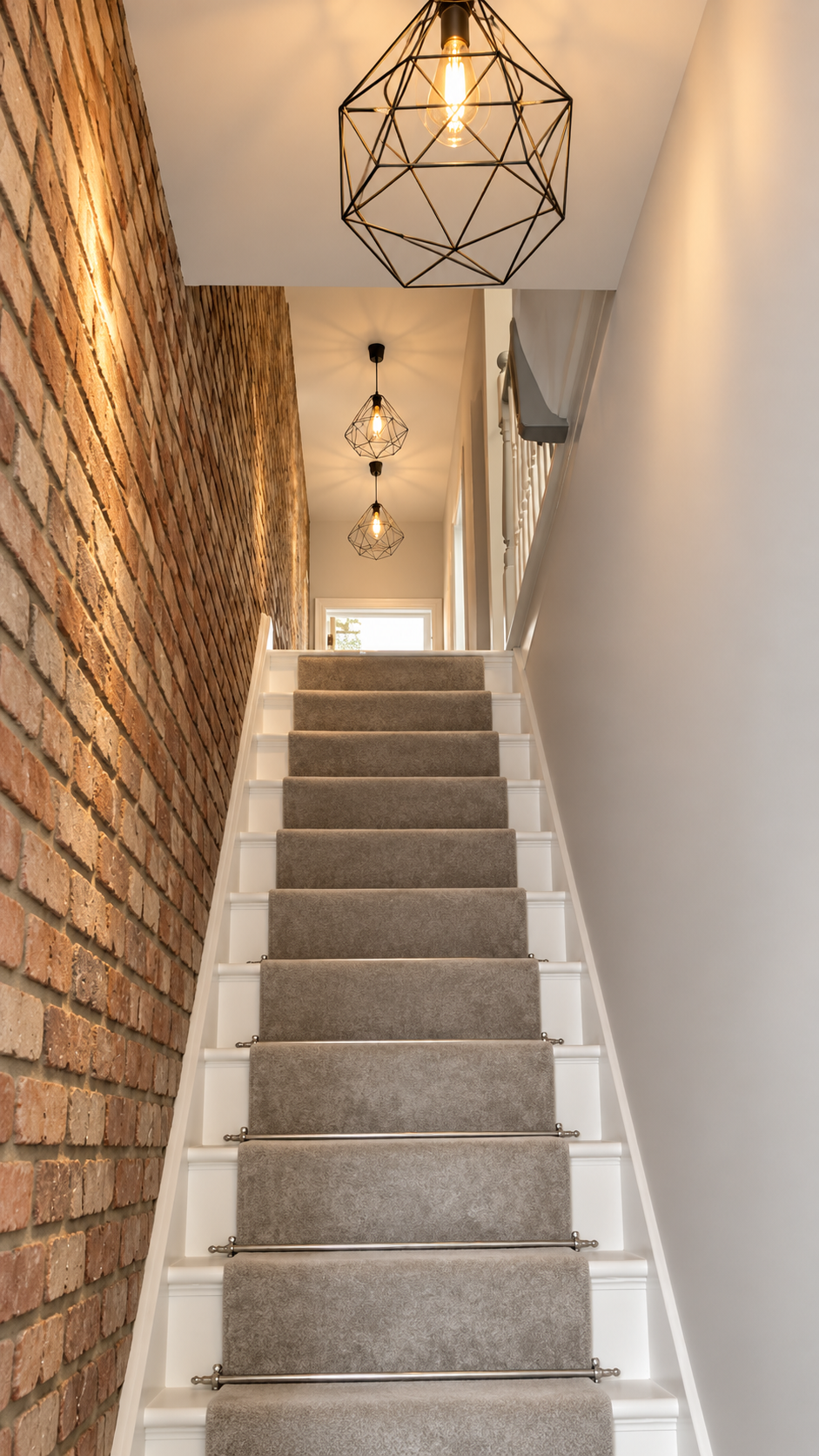 Completed staircase pendant lighting installation by Sparks R Us